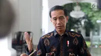 Presiden Joko Widodo atau Jokowi menjawab pertanyaan wartawan saat menerima perwakilan nelayan seluruh Indonesia di Istana Negara, Jakarta, Selasa (22/1). (Liputan6.com/Angga Yuniar)