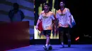 <p>Ganda putra Indonesia, Sabar Karyaman/Moh Reza Pahlevi memasuki lapangan jelang menghadapi pasangan Malaysia, Man Wei Chong/Kai Wun Tee pada laga semifinal turnamen bulu tangkis Indonesia Open 2024 di Istora Senayan, Jakarta, Sabtu (8/6/2024). (Bola.com/Bagaskara Lazuardi)</p>