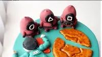 Squid Game Dijadikan Tema Kue Ulang Tahun, Bentuk Penjaganya Jadi Sootan. (dok.Instagram @bidibi.jkt/https://www.instagram.com/p/CUwRDcABsv0/Henry)