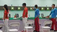 Petembak Indonesia yang turun di nomor 10M Air Riffle Mixed Team Asian Games 2018 di Palembang, Minggu (19/8/2018), gagal ke final. (Bola.com/Riskha Prasetya)