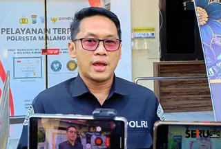 Kepala Seksi Humas Polresta Malang Kota, Ipda Lukman Sobhikin. (Liputan6.com/Hermawan Arifianto)