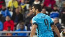 Luis Suarez setelah mencetak gol pembuka Barcelona atas Las Palmas, Sabtu (20/2/2016) / AFP