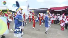 Obor Api Asian Games 2018 disambut pertunjukan marching band saat sampai di Penukal Abab Lematang Ilir, Sumatra Selatan.