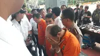 Direktorat Reserse Kriminal Umum Polda Metro Jaya saat merilis kasus penembakan istri yang dilakukan Dokter Helmi. (Liputan6.com/Hanz Jimenez Salim)
