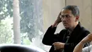 Anggito Abimanyu diperiksa sebagai saksi kasus dugaan korupsi penyelenggaraan ibadah haji di Kemenag dengan tersangka Suryadharma Ali, Jakarta, (7/9/14). (Liputan6.com/Miftahul Hayat)