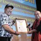 Film Warkop DKI Reborn tercatat dalam Museum Rekor Indonesia (MURI). Tidak tanggung-tanggung, film itu mendapatkan dua rekor sekaligus. Sebagai Penonton Terbanyak dan Jumlah Penonton Tercepat. (Adrian Putra/Bintang.com)