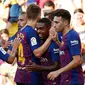 Penyerang Barcelona, Malcom berselebrasi bersama rekan-rekannya usai mencetak gol ke gawang Boca Juniors pada pertandingan Piala Joan Gamper di stadion Camp Nou, Spanyol (15/8). Barcelona menang telak 3-0 atas Boca Juniors. (AP Photo/Manu Fernandez)