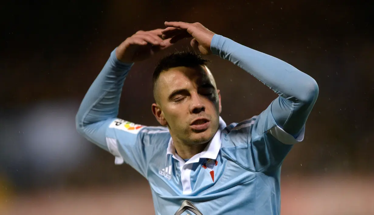 Ekspresi striker Celta Vigo, Iago Aspas, setelah mencetak gol ke gawang Deportivo La Coruna dalam laga La Liga Spanyol di Stadion Balaidos, Vigo, (2/4/2016). (AFP/Miguel Riopa)