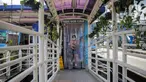 Calon penumpang memasuki bilik disinfektan di Halte Transjakarta Harmoni, Jakarta, Selasa (7/4/2020). Pemasangan bilik disinfektan tersebut sebagai upaya pencegahan penyebaran virus Corona COVID-19 di lingkungan Halte Transjakarta. (Liputan6.com/Faizal Fanani)