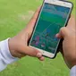 Trainer Pokemon Go berada di Pokestop (Liputan6.com/Mochamad Khadafi)