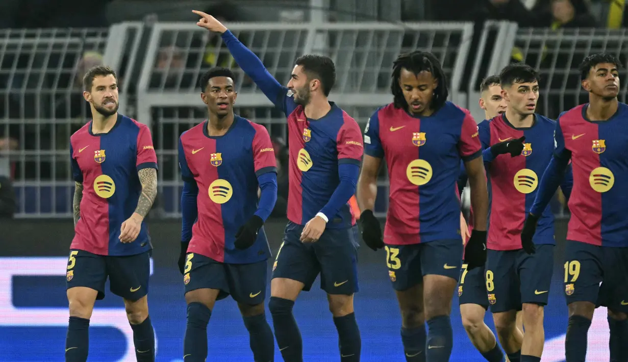 Hasil imbang antara Borussia Dortmund dan Barcelona tidak bertahan lama. Pada menit ke-85, Ferran Torres mencetak gol keduanya sekaligus penentu kemenangan Barcelona atas Borussia Dortmund. (INA FASSBENDER/AFP)