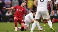Bintang muda Liverpool, Harvey Elliott, mengalami cedera parah saat timnya bersua Leeds United pada laga pekan keempat Premier League, Minggu (12/09/2021). (Foto:AFP/Oli Scarff)