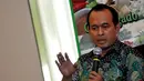 Ketua Populi Center Nico Harjanto saat menyampaikan berbagai pendekatan sebagai solusi untuk mengatasi konflik antara TNI dan Polri yang kerap terjadi di sejumlah daerah di Indonesia, Jakarta, Sabtu (22/11/2014). (Liputan6.com/Miftahul Hayat)