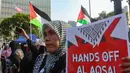 Massa AQSA Working Group (AWG) menggelar Aksi Jumat Nasional di depan Kedutaan Besar Amerika Serikat di Jakarta, Jumat, 21 Agustus 2026,. (KLY/ Arie Basuki)