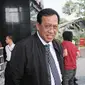 Dirjen Pajak Robert Pakpahan bersiap meninggalkan gedung KPK usai melakukan pertemuan, Jakarta, Rabu (31/1). Maksud kedatangannya adalah untuk berkoordinasi soal pencegahan terkait pajak perkebunan. (Liputan6.com/Herman Zakharia)