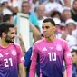 Ilkay Gundogan dan Jamal Musiala, dua pemain Jerman yang cetak gol ke gawang Hungaria di ajang Euro 2024 hari Rabu (19/06/2024) malam WIB. (DAMIEN MEYER / AFP)