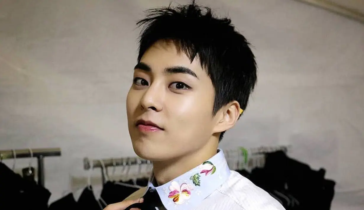 Chanyeol merupakan satu-satunya personel EXO yang punya tato di tubuhnya. Tak ayal hal itu membuat para EXO-L bertanya-tanya mengapa personel EXO lain tak punya tato. (Foto: Soompi.com)