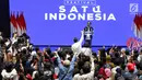 Calon Presiden petahana Joko Widodo saat memberikan pidato politiknya pada acara Festival Satu Indonesia di Istora Senayan, Jakarta, Minggu (10/3). Acara yang dihadiri kaum millenial mengajak pemilih untuk tidak golput. (Liputan6.com/Johan Tallo)