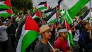 Ratusan warga dari Aliansi Rakyat Aceh Bela Palestina menggelar aksi unjuk rasa di Banda Aceh, Minggu 22 Juni 2025. (CHAIDEER MAHYUDDIN/AFP)
