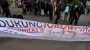 Dalam aksinya, mereka meminta kepada pemerintahan baru untuk melakukan terobosan dan perubahan yang berpihak pada korban secara signifikan, Jakarta, Kamis (11/12/2014). (Liputan6.com/Miftahul Hayat)