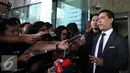 Achmad Rifai, Pengacara Bupati Kepulauan Morotai, Maluku Utara Rusli Sibua memberikan keterangan pers di KPK, Jakarta, Selasa (7/7/2015). Rifai menjelaskan kliennya tidak bisa hadir di KPK karena sedang mengurus Praperadilan. (Liputan6.com/Helmi Afandi)