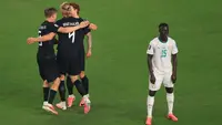 Penyerang Timnas Norwegia #09, Erling Braut Haaland, merayakan gol ketiga timnya selama pertandingan Grup I Piala Dunia 2026 antara Norwegia dan Senegal di Stadion New York/New Jersey di East Rutherford pada 22 Juni 2026. (Timothy A. CLARY/AFP)