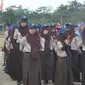 Dalam kebijakan baru tersebut, siswa SMP di Banyumas diwajibkan untuk menjalani sekolah enam hari dalam seminggu. (Liputan6.com/Muhamad Ridlo)