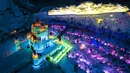 Foto dari udara ini menunjukkan taman hiburan es dan salju di Changchun, Provinsi Jilin, China timur laut, pada 12 Desember 2020. Taman hiburan es dan salju yang memiliki 142 bangunan es dan patung salju itu secara resmi dibuka untuk umum pada Sabtu (12/12). (Xinhua/Xu Chang)