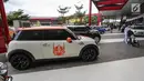 Deretan mobil Mini klasik dan terbaru pada Indonesia Mini Day 2018 di QBig BSD, Tangerang, Sabtu (15/12). Ratusan mobil Mini dari berbagai daerah berkumpul menyambut 60 tahun Mini di 2019. (Liputan6.com/Fery Pradolo)