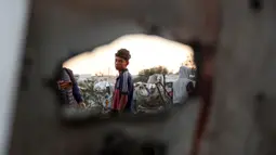 Israel kembali melakukan serangan ke kamp pengungsian sementara di Mawasi Khan Yunis, Jalur Gaza selatan pada Rabu malam 1 Januari 2025. (BASHAR TALEB/AFP)