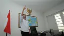 Di salah satu dinding ruangan terdapat burung garuda Pancasila dan peta Indonesia, Jakarta, Senin (4/8/14). (Liputan6.com/Herman Zakharia)  