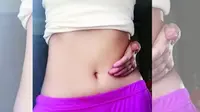 Belly-button challenge merupakan tantangan dimana Anda harus menjangkau pusar Anda melalui tangan yang berada di belakang pinggang.