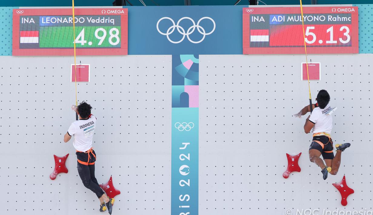 Setelah mencatat hasil positif di babak kualifikasi, dua atlet panjat tebing Indonesia, Veddriq Leonardo dan Rahmad Adi Mulyono harus bertemu di babak eliminasi nomor speed putra Olimpiade Paris 2024, Selasa (6/8/2024) di Le Bourget Climbing Venue, Paris, Selasa (6/8/2024). Hasilnya, Veddriq sukses mengungguli kompatriotnya dengan mencatat waktu 4,98 detik dan lolos ke perempat final. Sementara Rahmat Adi yang menorehkan waktu 5,13 detik dan sempat menjadi fastest looser, akhirnya tersingkir oleh atlet Iran, Reza Alipour yang mencatat waktu 5,06 detik di fase kualifikasi. (Dok. NOC Indonesia)
