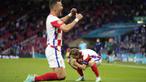 Tiga gol Kroasia yang diborong oleh Nikola Vlasic, Luka Modric, dan Ivan Perisic membuat Skotlandia tersingkir dari ajang Euro 2020 karena terdampar di dasar grup dengan nilai satu. (Foto: AP/Pool/Petr David Josek)