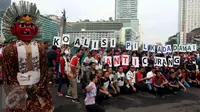 Kampanye ini dilakukan agar Pilkada putaran dua yang berlangsung diharapkan tidak ada kecurangan dikarenakan Pilkada DKI Jakarta menjadi contoh bagi kota - kota di Indonesia di Bundaran HI, Jakarta, Minggu (2/4). (Liputan6.com/Johan Tallo)