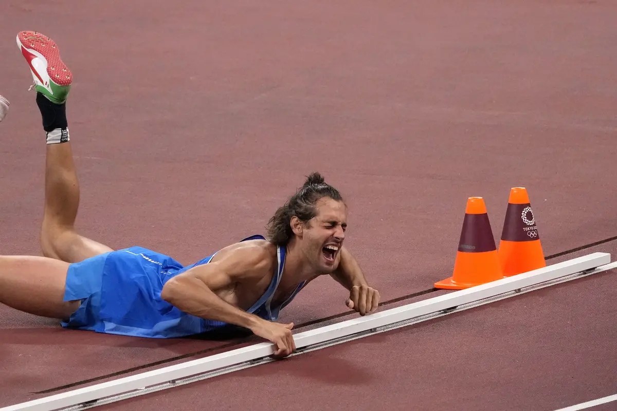 FOTO: Atlet Lompat Tinggi Qatar dan Italia Sepakat Berbagi Emas Olimpiade