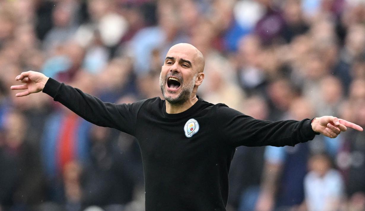Sementara itu gol Manchester City yang bertekad menjadi juara musim ini berhasil membalas lewat gol Jack Grealish dan bunuh diri Vladimir Coufal. (AFP/Justin Tallis)