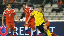 Aksi gelandang timnas Belgia, Leander Dendoncker pada laga perdana Kualifikasi Piala Eropa 2020 Grup I yang berlangsung di Stadion Roi Baudouin, Brussels, Jumat (22/3). Belgia menang 3-1 atas Rusia. (AFP/Bruno Fahy)