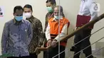 Gubernur Riau 2014-2019 Annas Maamun (rompi oranye) sesaat sebelum rilis penahanan di Gedung KPK, Jakarta, Rabu (30/3/2022). KPK resmi menahan Annas Maamun atas dugaan menyuap Ketua DPRD Riau 2009-2014, Johar Firdaus terkait pergeseran dan perubahan anggaran proyek. (Liputan6.com/Helmi Fithriansyah)