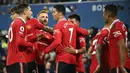 <p>Manchester United. Klub besutan Erik ten Hag ini total menyumbang 16 pemain yang akan berlaga di Piala Dunia 2022 Qatar yang didominasi oleh Timnas Brasil sebanyak 4 pemain. Sementara sisanya adalah Inggris (3), Portugal (3) dan masing-masing satu pemain untuk Denmark, Prancis, Belanda, Uruguay, Argentina dan Tunisia. (AFP/Oli Scarff)</p>