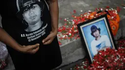 Kaos bergambar foto korban Tragedi Semanggi I, Bernardus Realino Norma Irmawan, Jakarta, Kamis (13/11/2014). (Liputan6.com/Faizal Fanani)