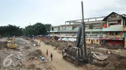 Proses revitalisasi Pasar Rumput, Pasar Manggis, Setiabudi, terus berlanjut, Jakarta, Selasa (19/4) Kios yang terletak di area parkir sebelah barat pun terus dibongkar. (Liputan6.com/ Gempur M Surya)