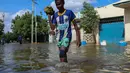 Banjir juga merendam pasar dan rumah sakit di wilayah tersebut. (Foto Hasan Ali Elmi/AFP)