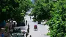 Pemerintah Bangladesh pada Senin (22/7/2024) mengumumkan hari libur nasional. Jam malam dengan perintah tembak di tempat diberlakukan. (Munir UZ ZAMAN/AFP)