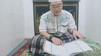Nazario Prianggara Kurniawan penyandang autisme dengan beragam kegiatan di bulan Ramadan. Foto: Dokumen Pribadi.