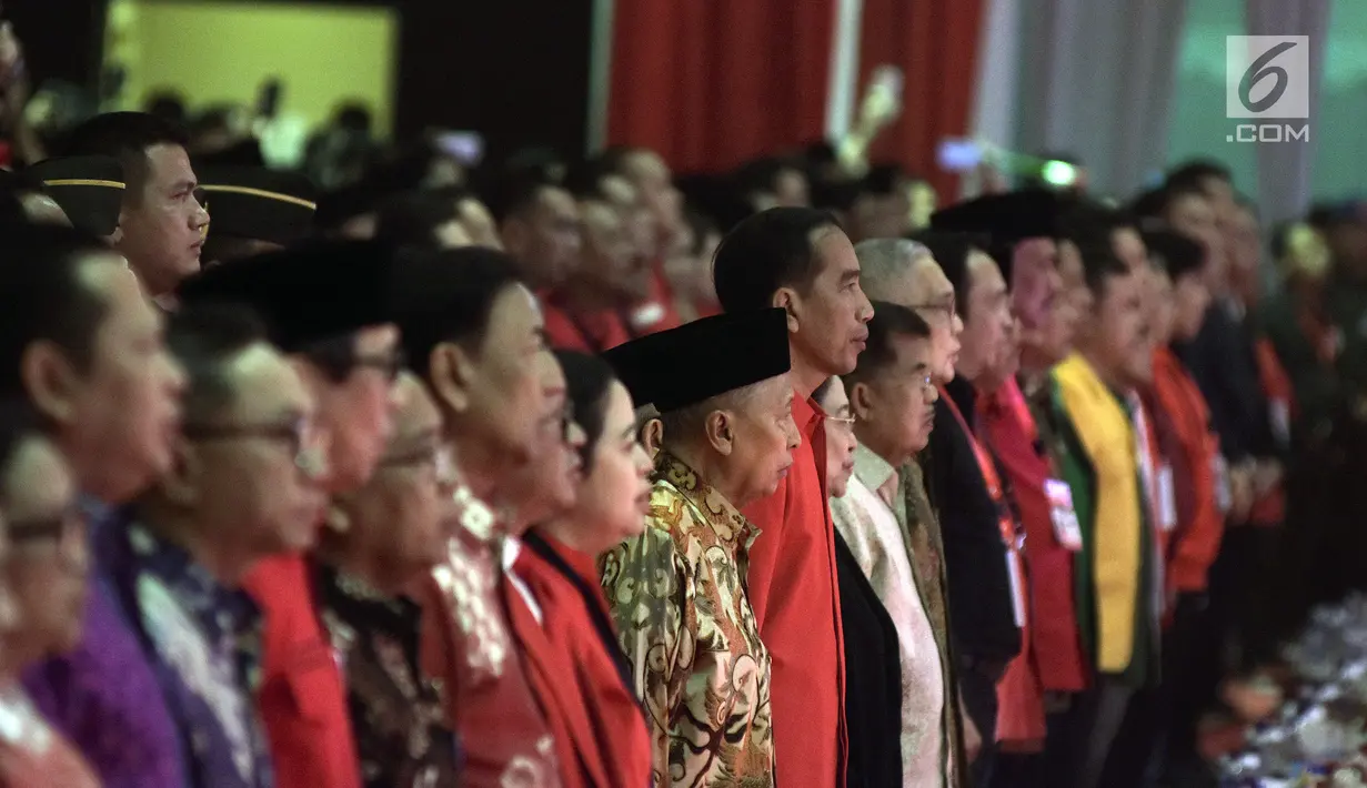Presiden Joko Widodo atau Jokowi saat menghadiri HUT ke-46 PDIP di JIExpo Kemayoran, Jakarta, Kamis (10/1). Dalam sambutannya Jokowi meminta para kader PDIP untuk menjaga Pancasila. (Liputan6.com/JohanTallo)