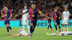 Raphinha tampil memukau saat Barcelona menang lima gol tanpa balas atas Young Boys dalam laga matchday 2 League Phase Liga Champions 2024/2025 yang digelar di Estadi Olimpic Lluis Companys, Rabu (2/10/2024). (AFP/Lluis Gene)