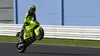Pembalap Pertamina Mandalika asal Swiss, Thomas Luthi memamerkan tunggangannya yang bertuliskan Grazie Vale saat ajang Moto2 Emilia Romagna yang digelar di Sirkuit Misano, Italia, Minggu (24/10/2021). (AFP/Andreas Solaro)