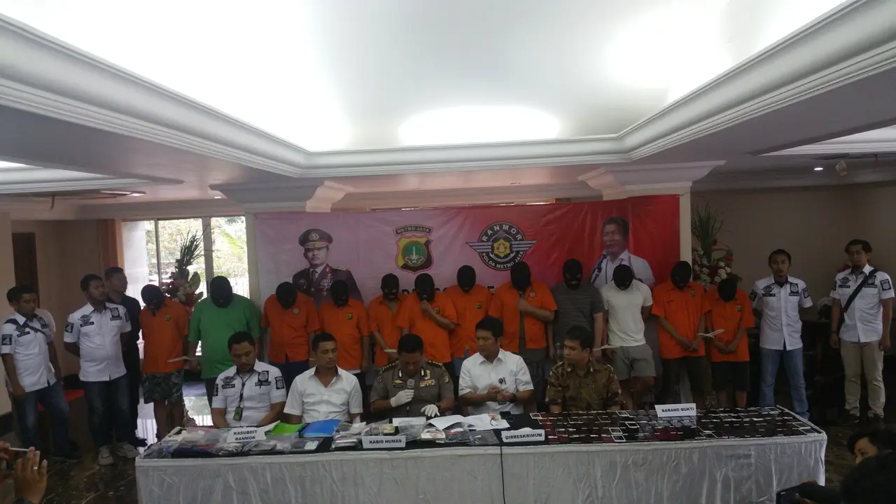 Polda Metro Jaya merilis pengungkapan kasus order fiktif yang dilakukan pengemudi taksi online nakal (Nanda Perdana/Liputan6.com)