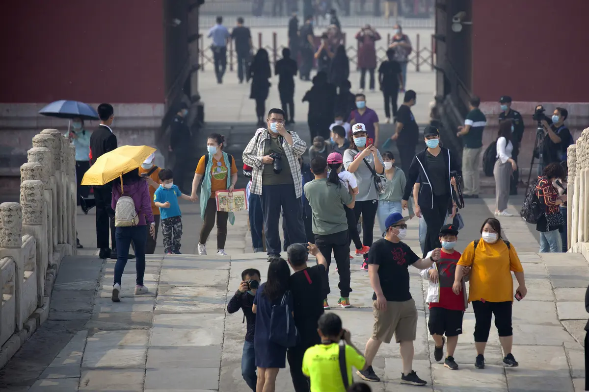 FOTO: Corona Mereda, Kota Terlarang China Kembali Dibuka